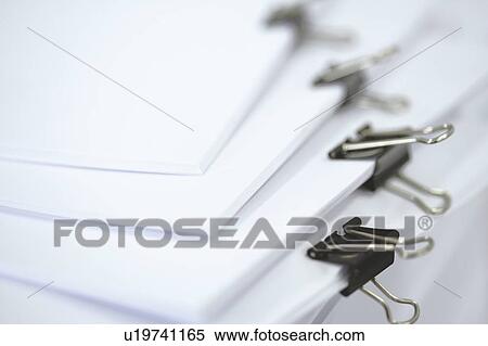 Pile of papers clipped together with binder clips View Large Photo Image Stock Photography - Pile of papers clipped together with binder clips. Fotosearch