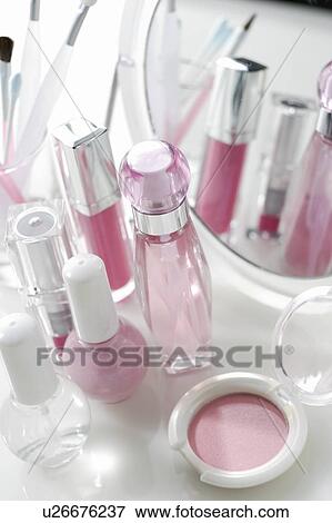 Pink make-up, perfume and nail polish View Large Photo Image Stock Photo - Pink make-up, perfume and nail polish. Fotosearch