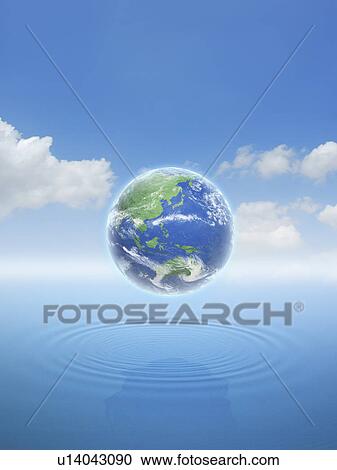 Stock Image - Planet earth above water. Fotosearch