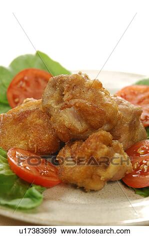 Plate of deep fried chicken, close up, white background View Large Photo Image Stock Photo - Plate of deep fried chicken, close up, white background. Fotosearch