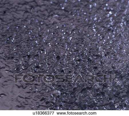 Stock Photo - Rain on asphalt. Fotosearch