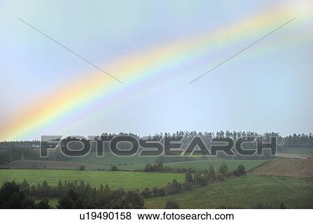 Rainbow in the Sky, Biei, Hokkaido, Japan View Large Photo Image Stock Photo - Rainbow in the Sky, Biei, Hokkaido, Japan. Fotosearch