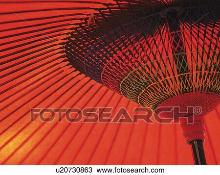 Stock Image - Red paper umbrella. Fotosearch