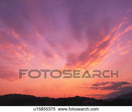 Rural landscape silhouetted against a pink sky and clouds View Large Photo Image Stock Photography - Rural landscape silhouetted against a pink sky and clouds. Fotosearch