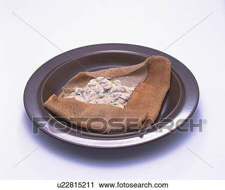 Stock Image - Savoury crepe made with buckwheat. Fotosearch