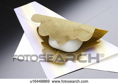 Stock Photo - shi dumpling in a leaf. Fotosearch