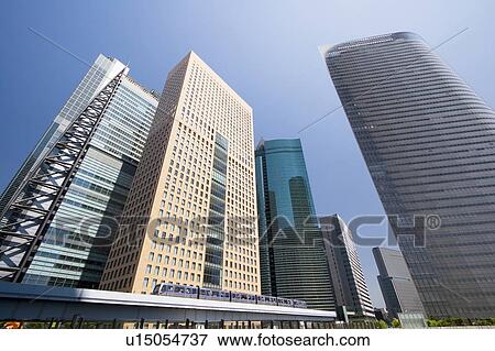 Shiodome skyscrapers and a train, Minato-ku, Tokyo, Japan View Large Photo Image Stock Photo - Shiodome skyscrapers and a train, Minato-ku, Tokyo, Japan. Fotosearch