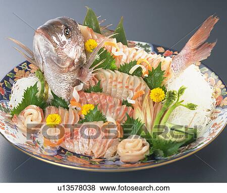 Sliced sea bream on a plate View Large Photo Image Stock Photo - Sliced sea bream on a plate. Fotosearch