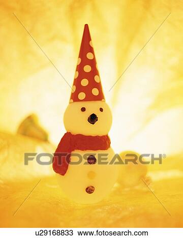 Snowman ornament wearing a pointy hat View Large Photo Image Stock Image - Snowman ornament wearing a pointy hat. Fotosearch