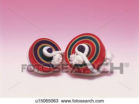 Stock Image - Spinning tops. Fotosearch
