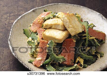 Stock Photograph - Stir-fried bitter melon. Fotosearch