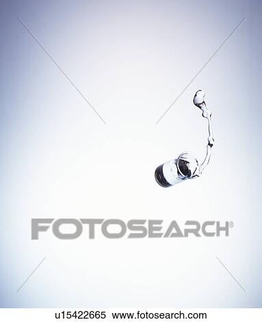 Studio shot of glass of water falling in mid-air View Large Photo Image Stock Photography - Studio shot of glass of water falling in mid-air. Fotosearch