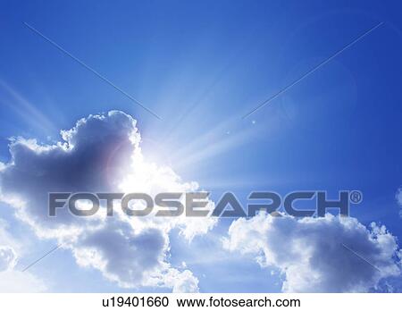 Sun behind clouds, lens flare, copy space View Large Photo Image Stock Image - Sun behind clouds, lens flare, copy space. Fotosearch