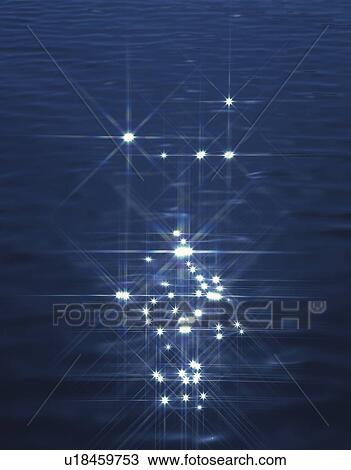 Stock Image - Sunlight shining off water surface. Fotosearch