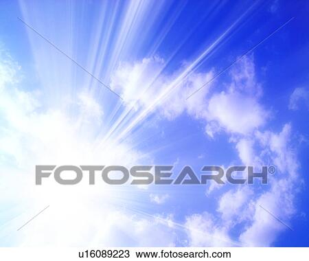 Stock Image - Sunlight through clouds. Fotosearch