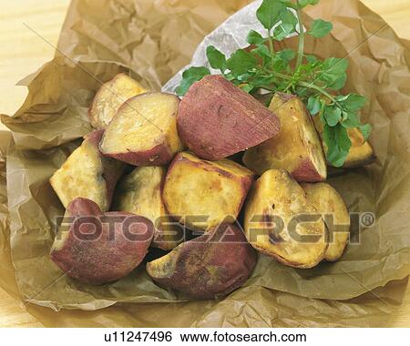Sweet potatoes in brown paper wrapping View Large Photo Image Stock Photograph - Sweet potatoes in brown paper wrapping. Fotosearch