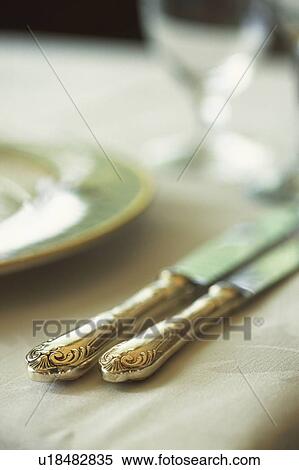 Stock Photography - Table set with silverware at a fine restaurant. Fotosearch