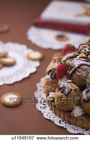 Tart and cookies, colored background View Large Photo Image Stock Photo - Tart and cookies, colored background. Fotosearch