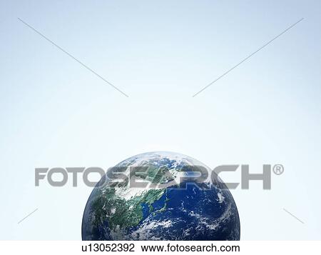 Stock Image - The earth, computer graphic, blue background, copy space. Fotosearch