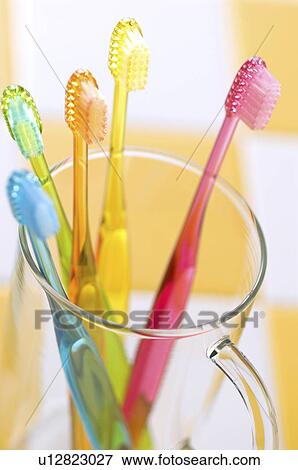 Toothbrushes in a cup View Large Photo Image Stock Photo - Toothbrushes in a cup. Fotosearch