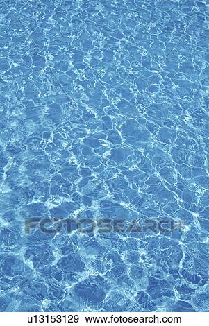 Water surface of a swimming pool View Large Photo Image Stock Photo - Water surface of a swimming pool. Fotosearch