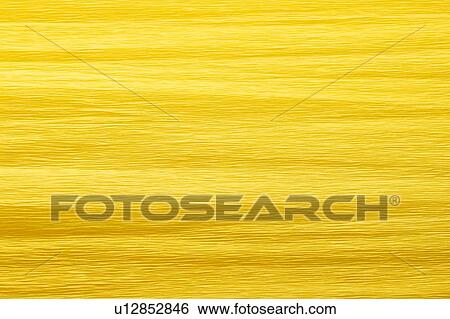 Stock Photograph - Yellow paper, close up, full frame, copy space. Fotosearch
