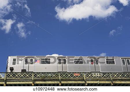 Stock Photo - Above ground subway cars. Fotosearch