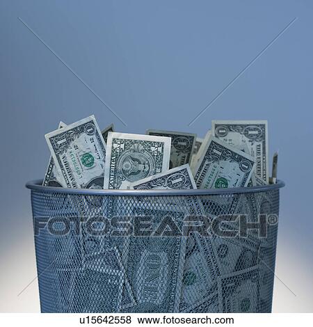 Stock Photo - Basket of money. Fotosearch