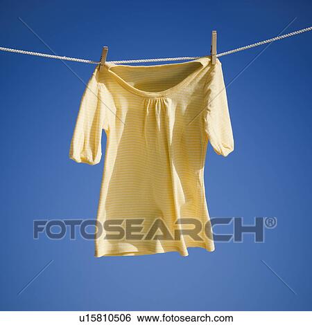 Stock Photograph - Blouse on clothes line. Fotosearch