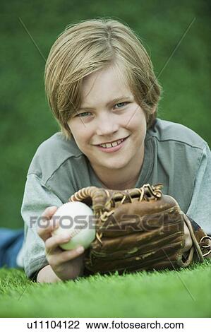 Boy with baseball and glove View Large Photo Image Stock Image - Boy with baseball and glove. Fotosearch