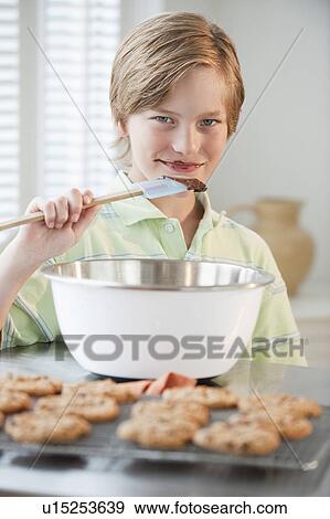 Child baking cookies View Large Photo Image Stock Photo - Child baking cookies. Fotosearch