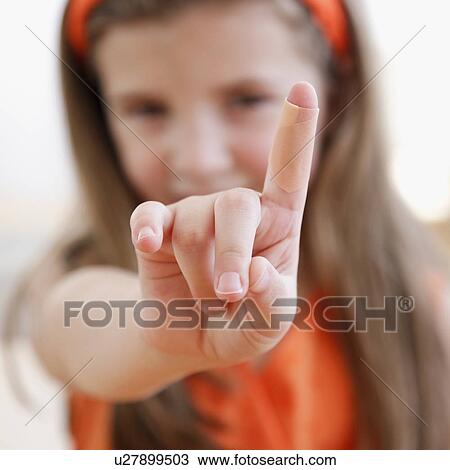 Stock Image - Child showing cut on finger. Fotosearch