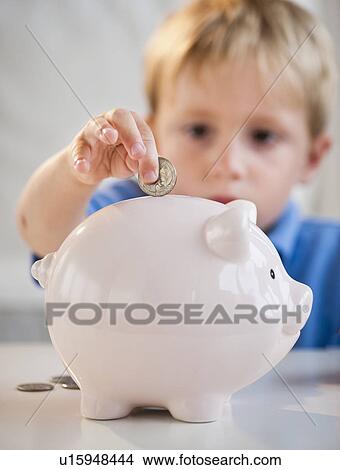 Child with piggybank View Large Photo Image Picture - Child with piggybank. Fotosearch