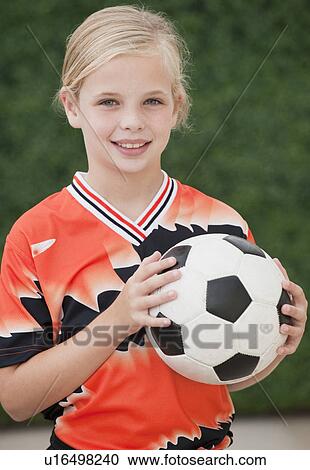 Stock Image - Child with soccer ball. Fotosearch