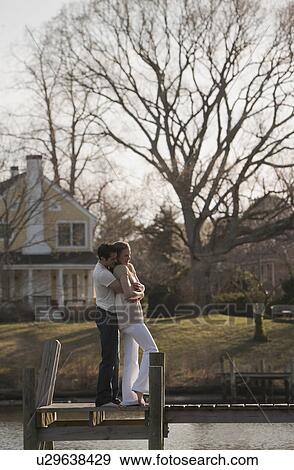 Stock Photo - Couple hugging. Fotosearch