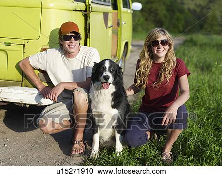 Couple with dog View Large Photo Image Stock Image - Couple with dog. Fotosearch