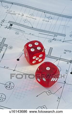 Stock Photograph - Dice on blueprint. Fotosearch