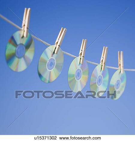 Discs on clothes line View Large Photo Image Stock Image - Discs on clothes line. Fotosearch