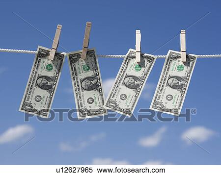 Stock Photography - Dollars on clothes line. Fotosearch