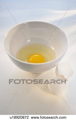 Stock Image - Egg in bowl. Fotosearch