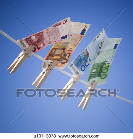 Euro on clothes line View Large Photo Image Stock Photo - Euro on clothes line. Fotosearch