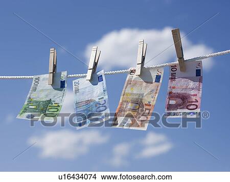 Picture - Euros on clothes line. Fotosearch