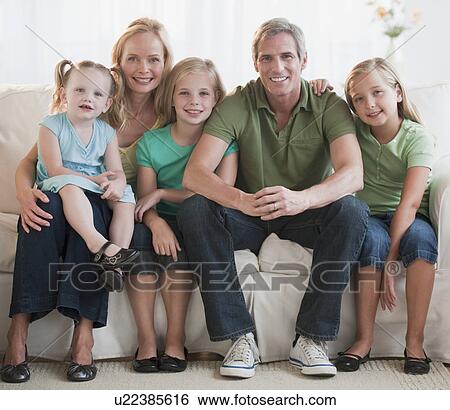 Stock Photograph - Family at home. Fotosearch