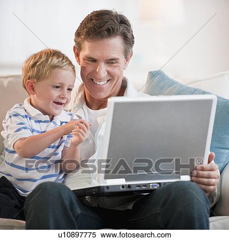 Father and child at home View Large Photo Image Stock Photography - Father and child at home. Fotosearch