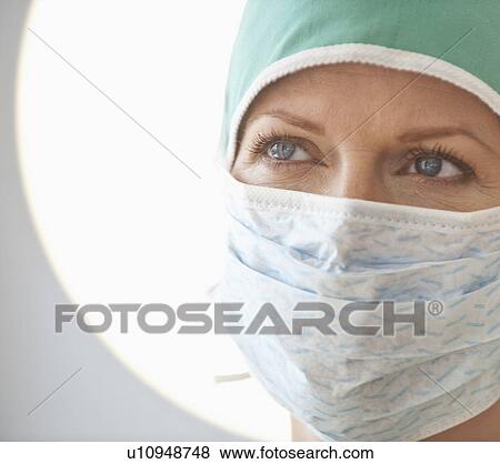Female doctor with surgical mask View Large Photo Image Stock Photo - Female doctor with surgical mask. Fotosearch