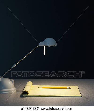 Stock Photo - Light and pad of paper. Fotosearch