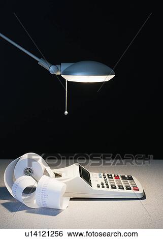 Stock Photograph - Light on calculator. Fotosearch