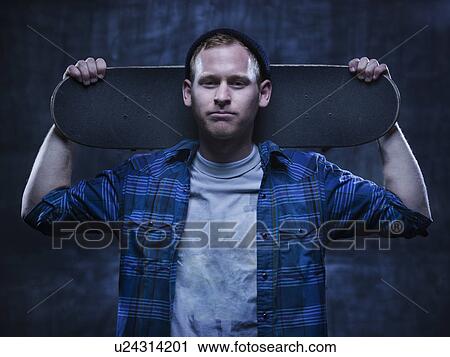Stock Image - Male Skateboarder. Fotosearch
