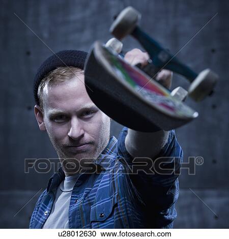 Stock Image - Male Skateboarder. Fotosearch