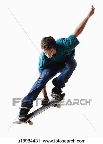 Male skateboarding View Large Photo Image Stock Image - Male skateboarding. Fotosearch